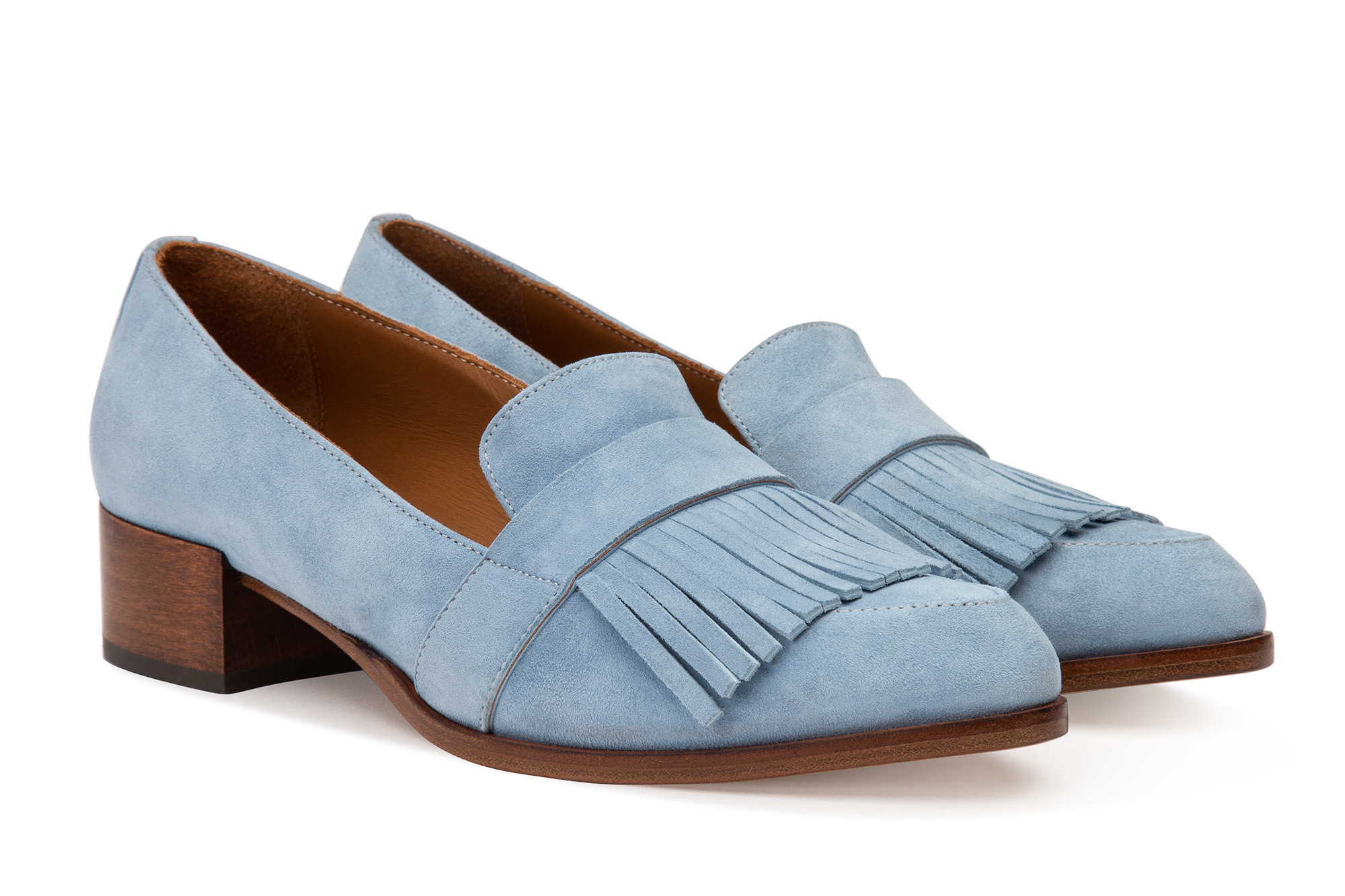 Ecommerce photography for Thelma Shoes, women's powder blue suede loafer with tassels